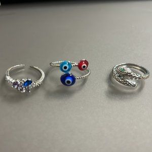 NWOT Bundle of 3 adjustable silver tone rings